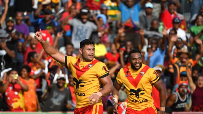 Papua New Guinea's Rhys Martin celebrates after scoring a try.