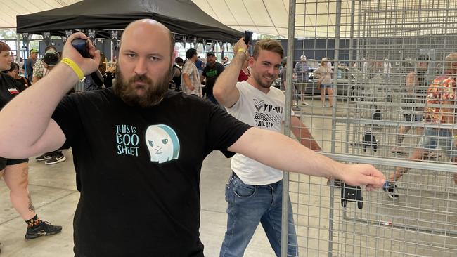 Croydon's Adam Glanville and Mooroolbark's Shane Hayden had a shot at axe throwing at Meatstock 2023.