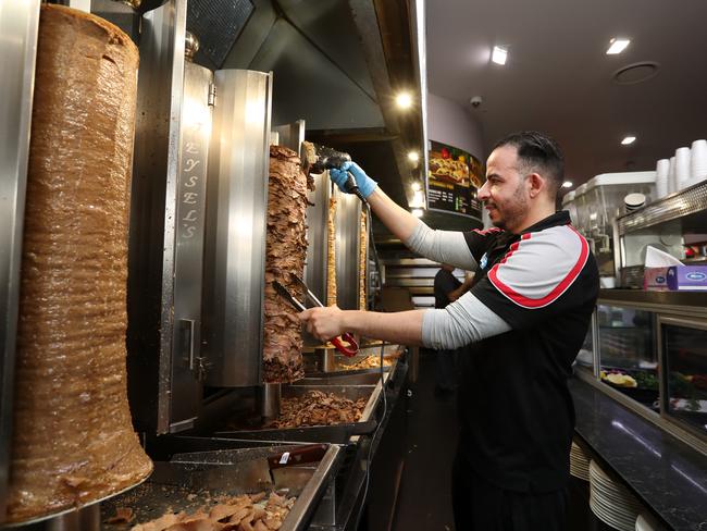 Staff member Taha Elsayed making a kebab at New Star Kebabs. Picture: Jonathan Ng