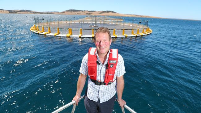 Clean Seas Seafood farm manager Chester Wilkes with kingfish pens at Port Lincoln.