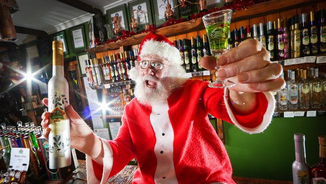 Michael Ward from Tambourine Mountain Distillery getting into the Christmas spirit with his latest creation 'Festive Fruits Cocktail Liqueur' manufactured specifically for the festive season. Picture: NIGEL HALLETT