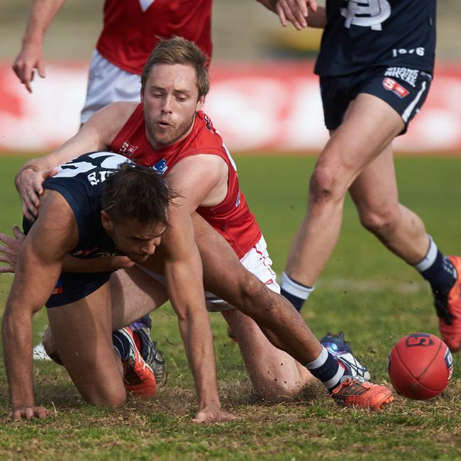 Josh Gregg tackles a South Adelaide opponent when he played for North Adelaide in the SANFL in 2016. Picture: Matt Loxton