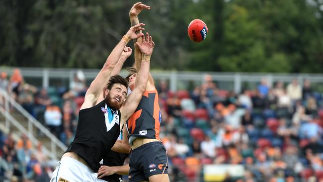 Charlie Dixon flies for a mark against GWS.