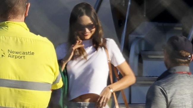 Miranda Kerr and Evan Spiegel make a low-key international arrival at Newcastle Airport, flying in from Los Angeles to Williamstown Airport, on Monday. Picture: Media Mode