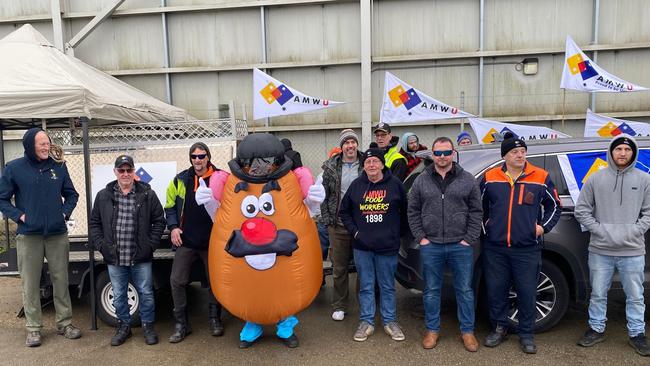 Workers outside McCain's Smithton potato processing factory.