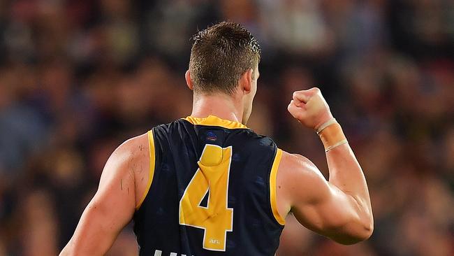 Josh Jenkins celebrates one of his five goals against Richmond. Picture: Daniel Kalisz/Getty Images