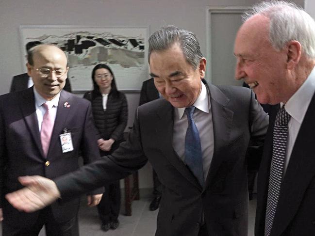 # Must Credit # 21/03/2024: (L-R) China's ambassador to Australia Xiao Qian, China's foreign minister Wang Yi greet former prime minister of Australia Paul Keating as he arrives for a meeting at the Chinese Consulate in Sydney. MUST CREDIT: CGTN