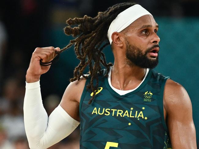 Australia's #05 Patty Mills reacts after in the men's quarterfinal basketball match between Serbia and Australia during the Paris 2024 Olympic Games at the Bercy  Arena in Paris on August 6, 2024. (Photo by Aris MESSINIS / AFP)