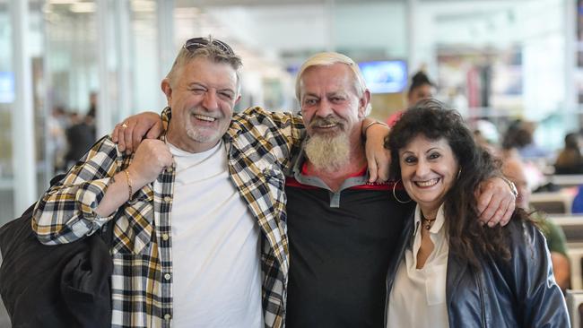 Chris Harwood with brother Stephen Harwood and Chris wife to be, Rita Romeo at Adelaide airport. Picture: Roy VanDerVegt