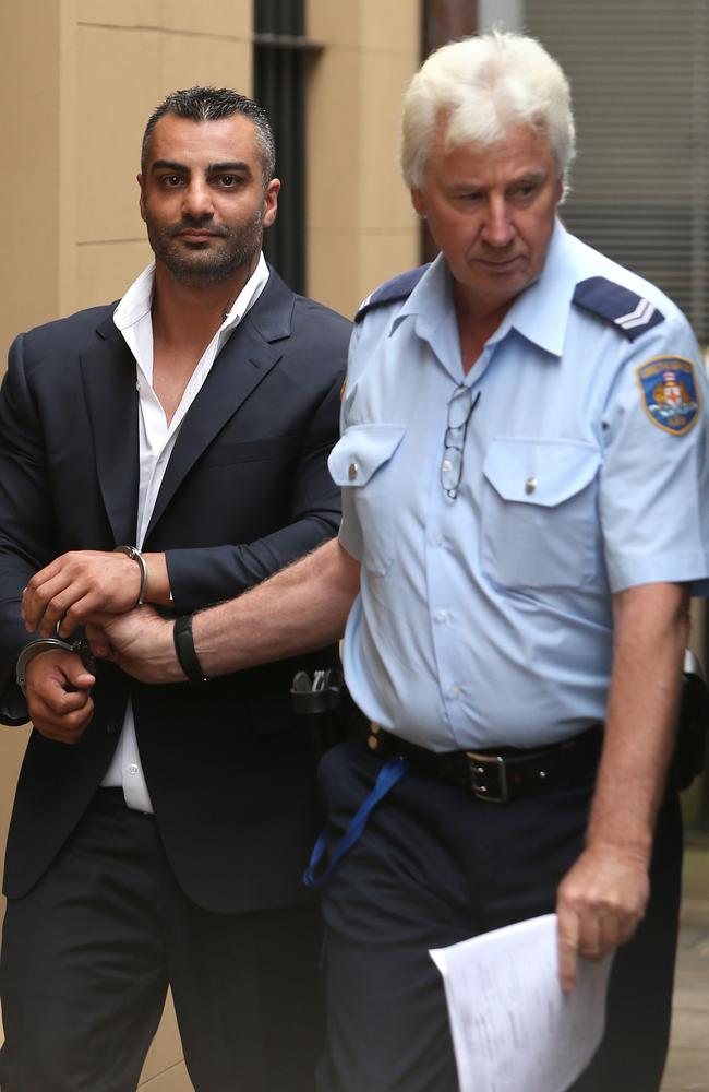 Mick Hawi leaves Kings Street Court in custody after pleading guilty to the manslaughter of Anthony Zervas. Picture: Bradley Hunter