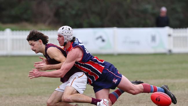 Action from the Colts game between Wilston Grange and Palm Beach Currumbin. Pictured is CurrumbinÃ&#149;s Jack Foggo, left. Picture: Tertius Pickard