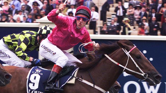 Jockey Brett Prebble celebrating winning the 2000 VRC Oaks with Lovelorn. Picture: Andrew Tauber