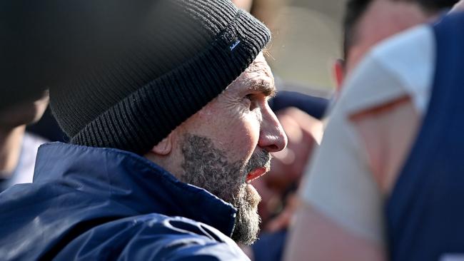 Old Melburnians coach Paul Satterley addressing his players in their loss against Old Xaverians last week. Picture: Andy Brownbill