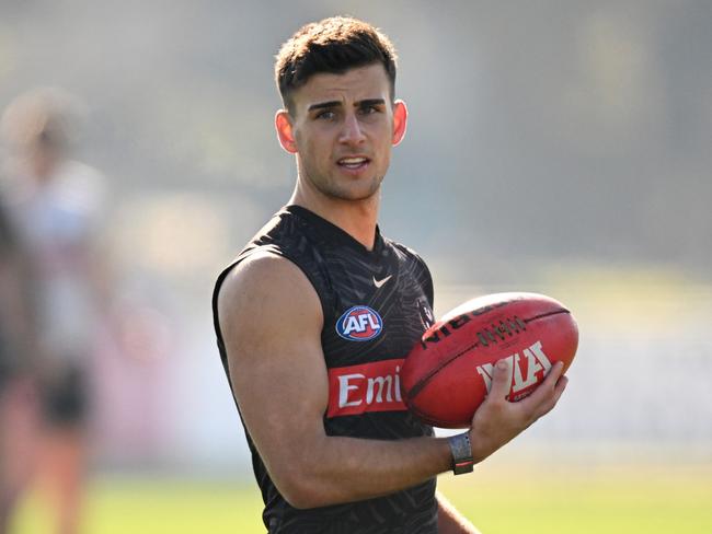 MELBOURNE, AUSTRALIA - JULY 03: Nick Daicos of the Magpies looks on during a Collingwood Magpies AFL training session at Olympic Park Oval on July 03, 2024 in Melbourne, Australia. (Photo by Daniel Pockett/Getty Images)