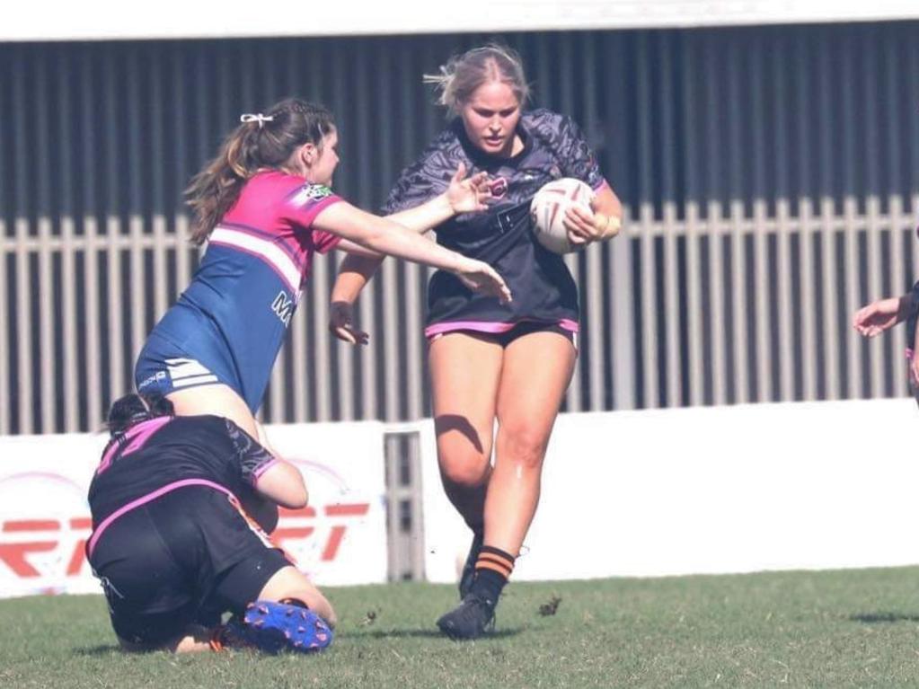 Tori Dakin in action with her club side, the Rockhampton Tigers.