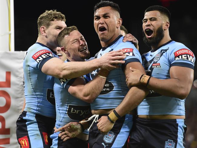 TOWNSVILLE, AUSTRALIA - JUNE 09:  Daniel Saifiti of the Blues celebrates with team mates after scoring a try during game one of the 2021 State of Origin series between the New South Wales Blues and the Queensland Maroons at Queensland Country Bank Stadium on June 09, 2021 in Townsville, Australia. (Photo by Ian Hitchcock/Getty Images) *** BESTPIX ***