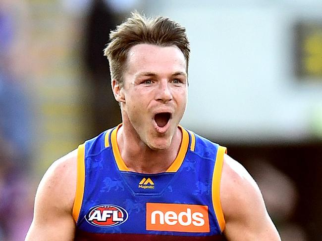 BRISBANE, AUSTRALIA - AUGUST 17: Lincoln McCarthy of the Lions celebrates victory after the round 22 AFL match between the Brisbane Lions and the Geelong Cats at The Gabba on August 17, 2019 in Brisbane, Australia. (Photo by Bradley Kanaris/AFL Photos via Getty Images )