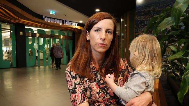 Dr Harriet Dempsey-Jones, with daughter Lyra, 2, says parents were told last week that library reading programs would be cut. Picture: Liam Kidston