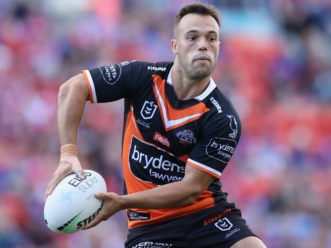 NEWCASTLE, AUSTRALIA - MARCH 28: Luke Brooks of the Tigers in action during the round three NRL match between the Newcastle Knights and the Wests Tigers at McDonald Jones Stadium on March 28, 2021, in Newcastle, Australia. (Photo by Ashley Feder/Getty Images)