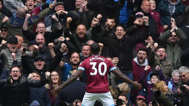 Antonio celebrates with delirious West Ham fans. Picture: AFP