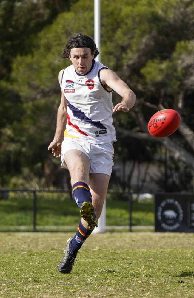 Tom Stait taking a kick for the Caulfield Bears. Picture: Valeriu Campan