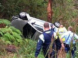 This car missed the pole but rolled down the embankment where it struck a tree. Picture: supplied