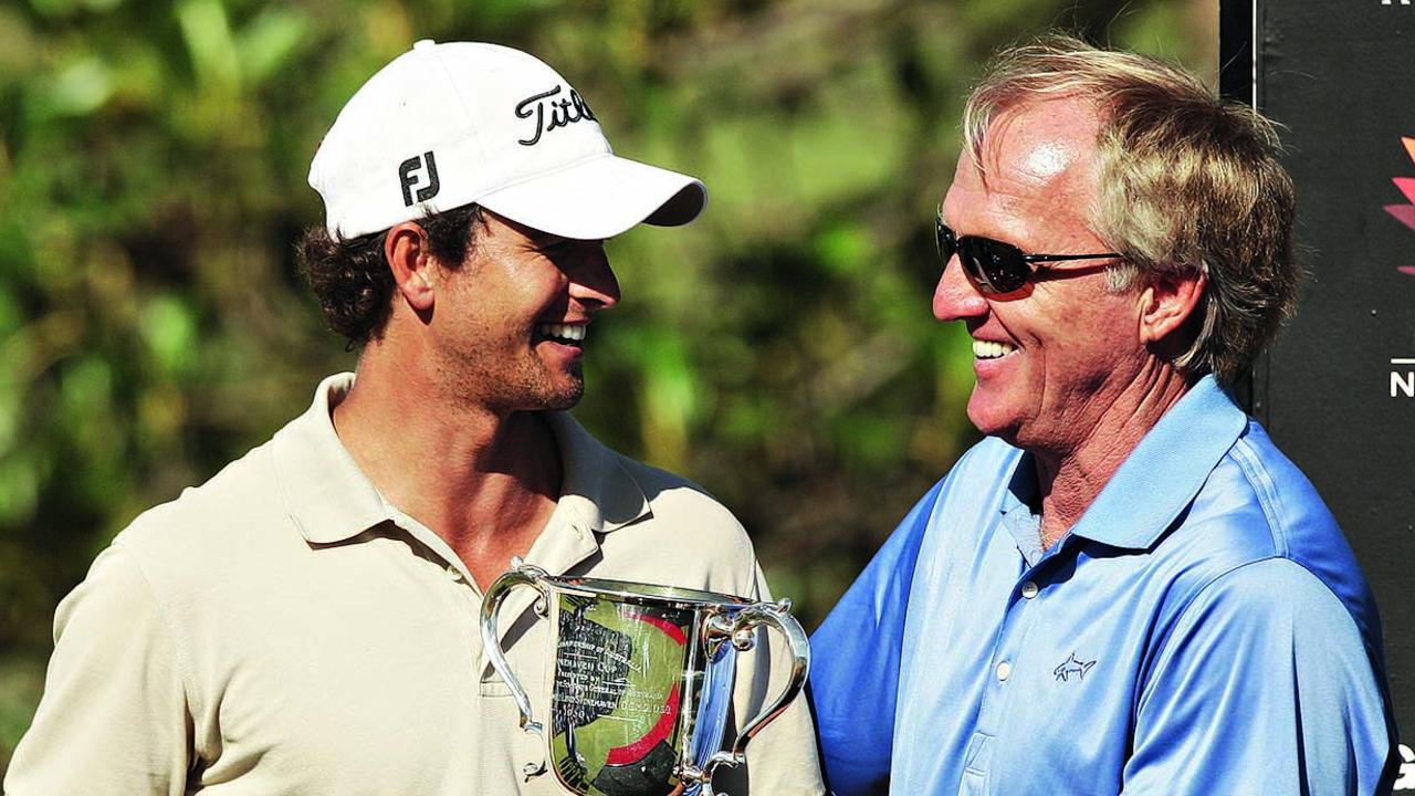 Greg Norman is respected for his encouragement of Australian players including Adam Scott, pictured here receiving the 2009 Australian Open trophy from Norman. Picture: Phil Hillyard