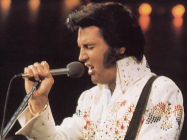 Undated pic of singer Elvis Presley on stage - music singers performing