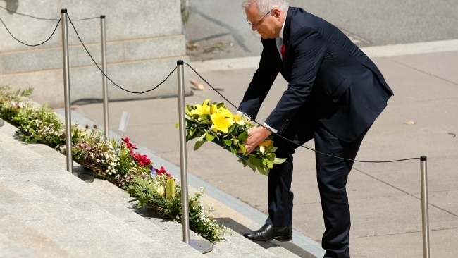 Mr Morrison lays a wreath during the Remembrance Day service at the Shrine of Remembrance. Picture: Darrian Traynor/Getty Images