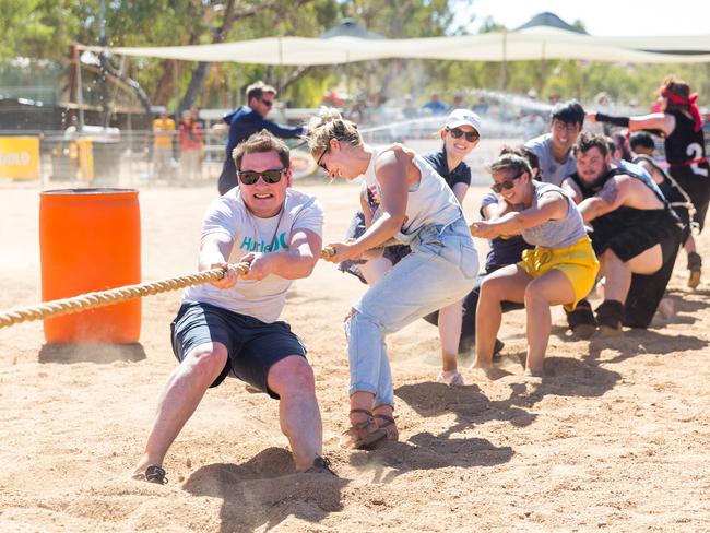Staff from the Alice Springs Hospital do their best in the Anchor the Boat tug of war competition at the Henley on Todd Regatta in Alice Springs August 19 2017. Photo: EMMA MURRAY