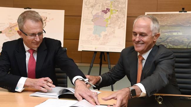 Prime Minister Malcolm Turnbull and Federal Urban Infrastructure Minister Paul Fletcher formally sign off on the new airport plan. Picture: AAP