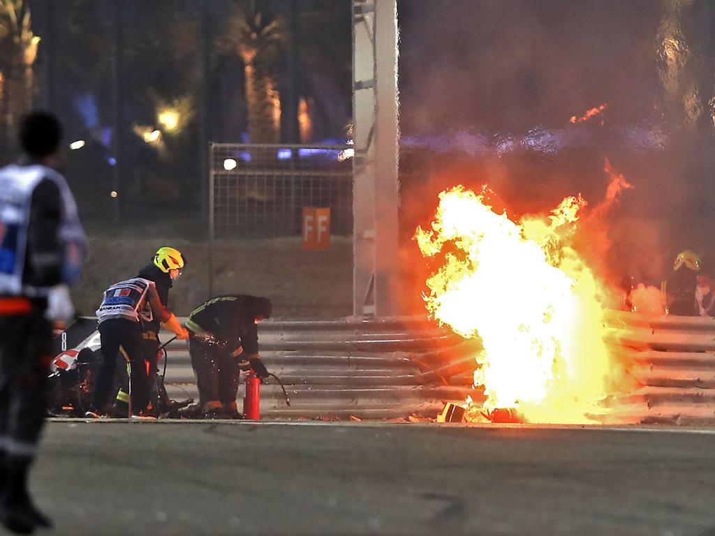 Stewards rushed to Grosjean’s aid.