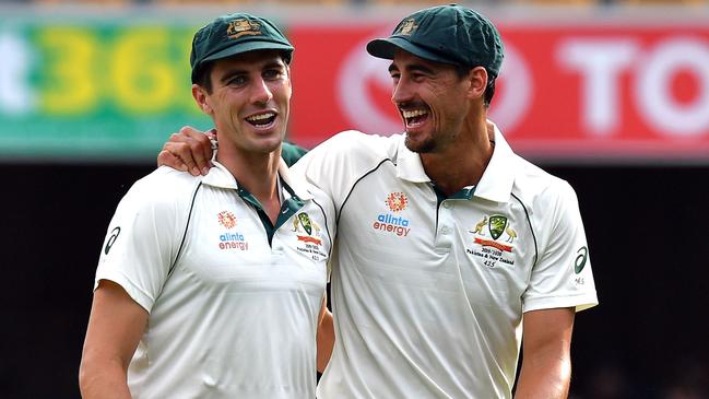 Pat Cummins (left) and Mitchell Starc (right) will lead Australia’s pace battery in Adelaide. Picture: Saeed Khan/AFP