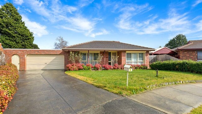 A three-bedroom house at 14 Mueller Court, Endeavour Hills has a $740,00 -$800,000 price range.