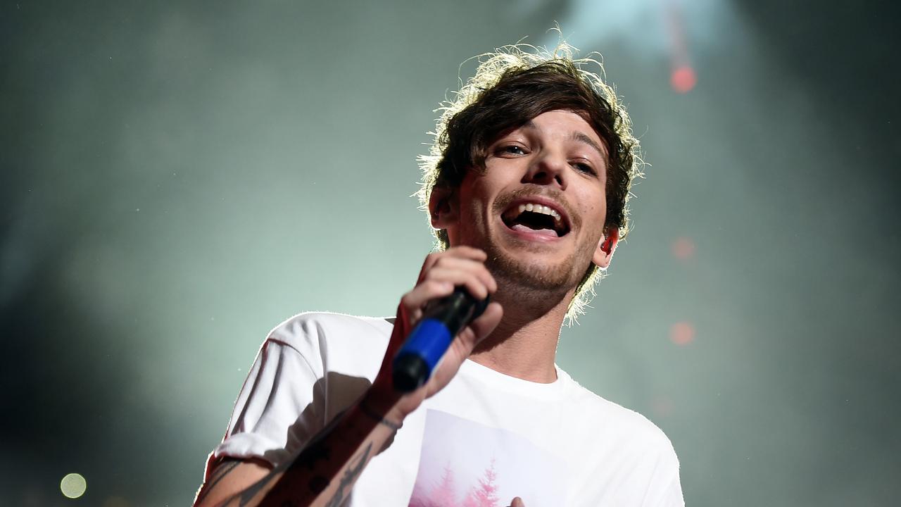 Louis Tomlinson lands in NYC after split from girlfriend
