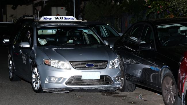 The taxi crashed into parked cars during the attempted car jacking. Picture: Bill Hearne