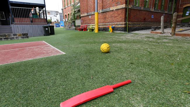 Sports equipment is seen left outside at a primary school in Melbourne's inner north after school holidays were brought forward. Picture: AAP Image/James Ross