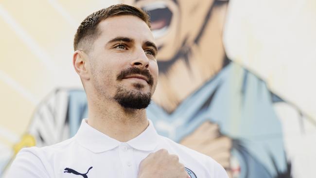 A mural was unveiled today in Melbourne in honour of Melbourne City striker Jamie Maclaren, the greatest goalscorer in A-League history., The mural was painted by Hannah Wilkinson, who plays for the Melbourne City women's team. She is in a few of the photos with Jamie. Picture: Supplied ,