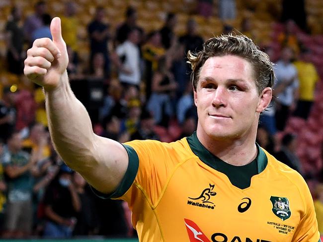 BRISBANE, AUSTRALIA - NOVEMBER 07: Michael Hooper and Nic White of the Wallabies wave to the fans as they celebrate victory after the 2020 Tri-Nations match between the Australian Wallabies and the New Zealand All Blacks at Suncorp Stadium on November 07, 2020 in Brisbane, Australia. (Photo by Bradley Kanaris/Getty Images)