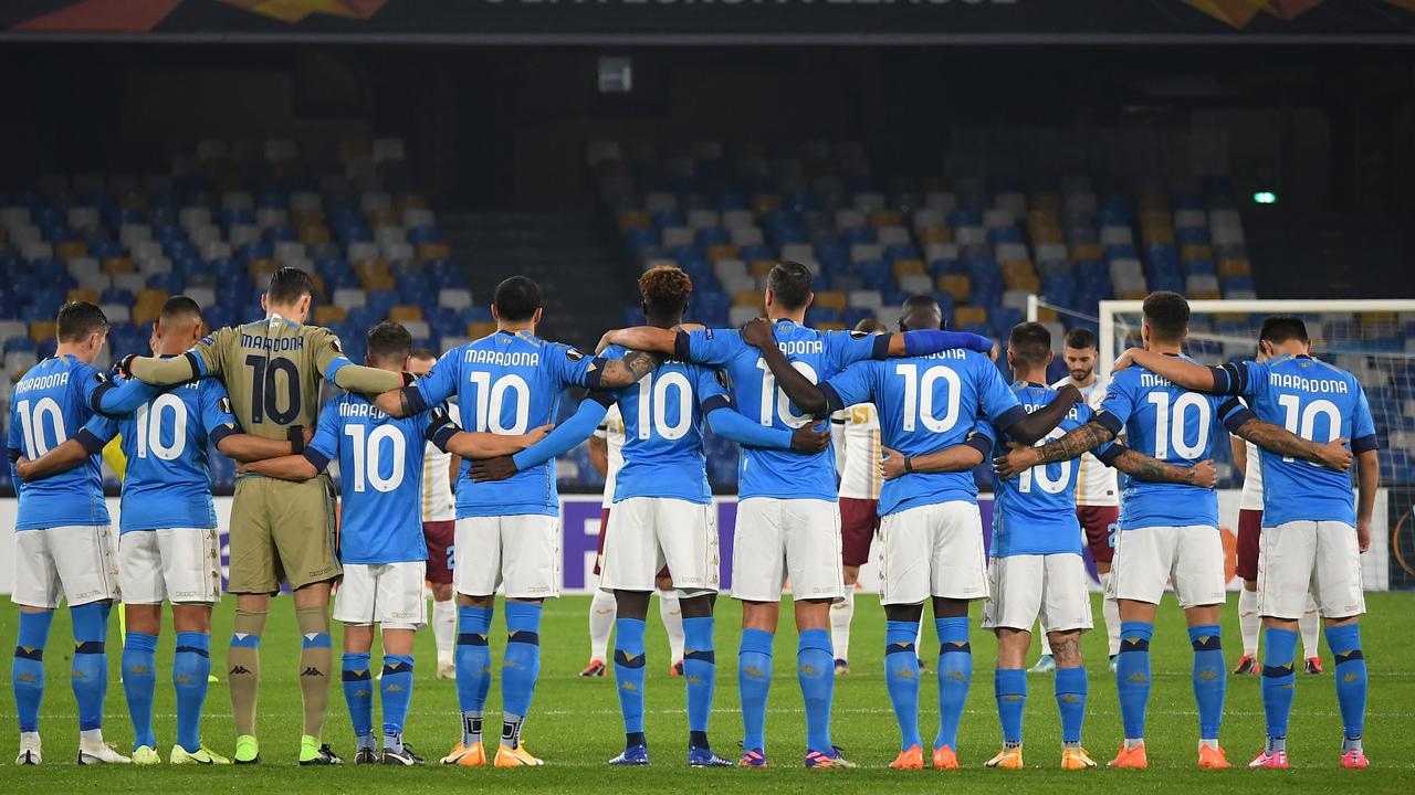Players and Officials observe a minute of silence prior to kick off in memory of Diego Maradona.