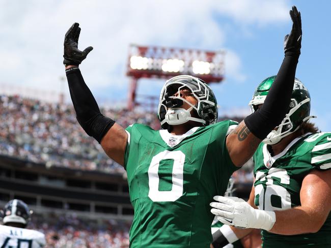 NASHVILLE, TENNESSEE - SEPTEMBER 15: Braelon Allen #0 of the New York Jets reacts after scoring a touchdown during the first half against the Tennessee Titans at Nissan Stadium on September 15, 2024 in Nashville, Tennessee. (Photo by Justin Ford/Getty Images) *** BESTPIX ***