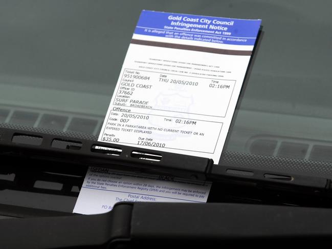 The Gold Coast City Council has agreed to increase hourly parking rates in metered areas, and are looking to increase the number of metered areas. A fine placed under the windscreen wiper of a car.