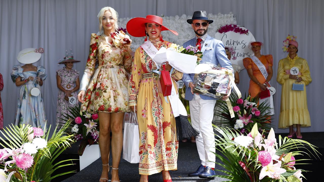 Louise Struber of Cairns Central, Local Ladies fashion winner Sophie Kirkham and fashion judge Neil Carpenter at the Cairns Central Fashions on the Field competition at Cairns Amateurs Ladies Day last year. Picture: Brendan Radke