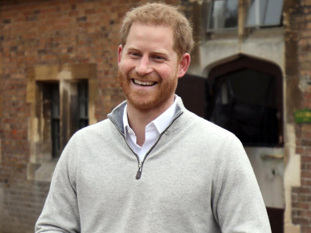 Harry showing off his best new dad grin. Picture: Steve Parsons / POOL / AFP