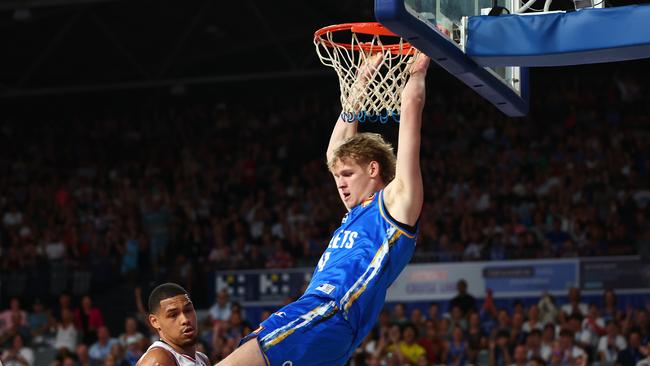 BRISBANE, AUSTRALIA - FEBRUARY 09: Rocco Zikarsky of the Bullets dunks during the round 19 NBL match between Brisbane Bullets and Adelaide 36ers at Nissan Arena, on February 09, 2024, in Brisbane, Australia. (Photo by Chris Hyde/Getty Images)