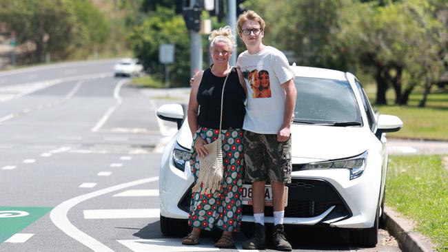 The future growth and success of the agricultural and import industries in Far North Queensland relies on the upgrade of the crucial link between Cairns and the Tablelands, the Kuranda Range Road. Mareeba residents Karyn Mitchell and her son Zeph Mitchell, 17, at the start of the Kennedy Highway at Smithfield. The family drives the Kuranda Range Road up to eight times a week. Picture: Brendan Radke