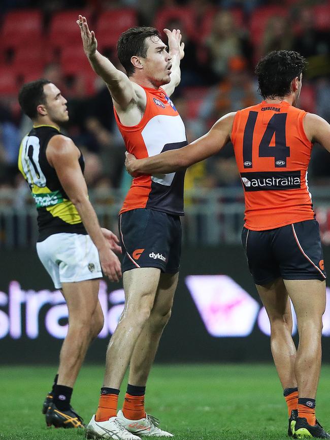 Jeremy Cameron watches his matchwinner sail through with a minute left. Picture: Phil Hillyard