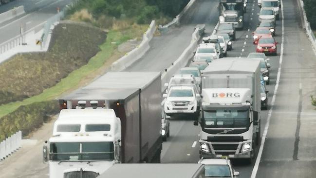 FIERY TRUCK CRASH: M1 Traffic chaos northbound.. after a B Double ran into 3 stationary roadworks trucks on M1 near Warnervale just after 2am. 5 men taken to hospital including the truck driver with shoulder injury and he will undergo mandatory testing. Picture: Twitter / Steve Hart