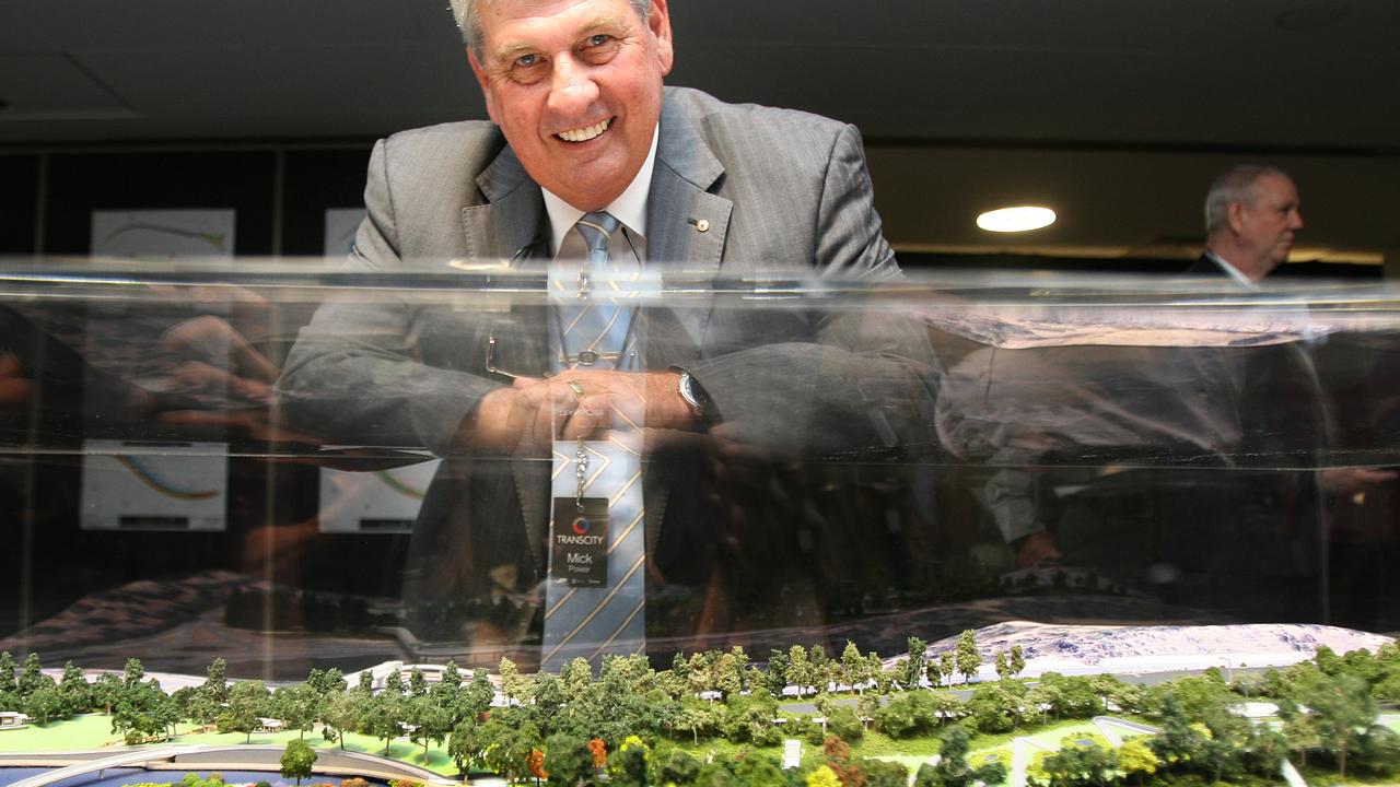 Mick Power with model of Legacy Way in 2010. Picture: Annette Dew