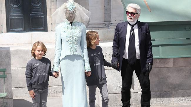 “Adut the Chanel Bride”, pictured with Karl Lagerfeld, had the honour of closing the show at the Grand Palais. Picture: KCS Presse / MEGA